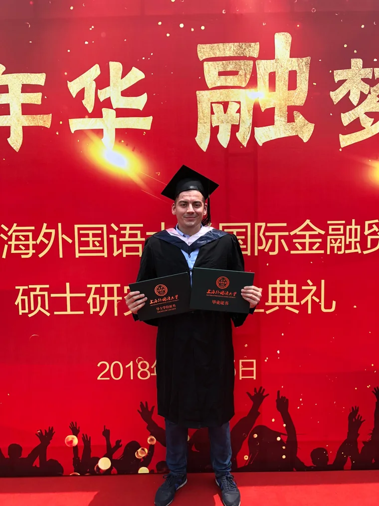Ilia Bakulin graduation photo in Shanghai